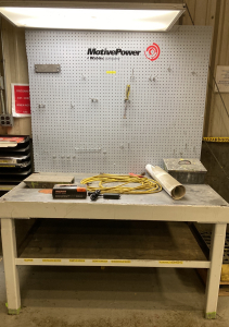 Workbench with Bag Pegboard for Tools and Light on Top