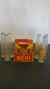 Vintage Nehi Soda Bottles and a Cardboard Carrier.