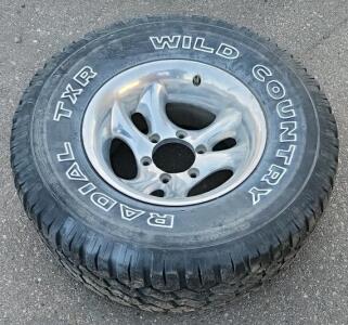 Wild Country Radial TXR 31x10.50R15LT Tire with Alloy Rim