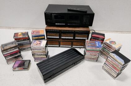 (1) Optimus SCT-53 Dual Cassette Deck W/ Remote (2) Vintage 3-Drawer Audio Cassette Tape Storage Holder (1) Casette Storage Case (82) Assorted Cassette Tapes