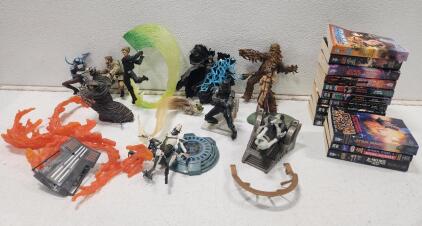 Assorted Star Wars Figurines And Books