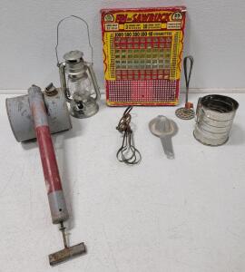 (1) Vintage Fin And Sawbuck Punch Board (1) Vintage Continuous Sprayer, no brand (1) Olde Brooklyn Lantern LED Light Vintage Style, unable to test (1) Antique Egg Beater, All Metal (1) Foley Aluminum Fruit Orange Lemon Juicer Reamer Manual (1) Vintage M