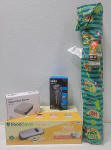 (1) FoodSaver Compact Vacuum Sealing System (1) Braun Series 5 Electric Shaver (1) Wyze AX3000 Dual-Band Wi-Fi 6 Mesh Router (1) Ozark Trail "Let's Taco Bout It" Camp Chair