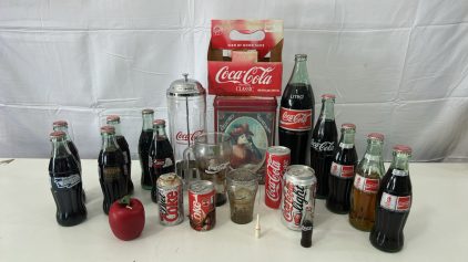 (1) Vintage 1-Liter Glass Bottle Of Coca-Cola From Mexico (1) Vintage Coca-Cola Decorative Tin Container (9) Vintage Classic Coca-Cola Collectible 8 oz Glass Bottles & More