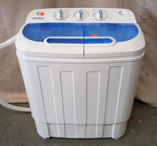 Dnyker portable twin tub washing machine. It is a compact, semi-automatic washer and spinner designed for small loads of laundry. Great For Camper Trailers or Doorm Rooms. 26"x21"x13"