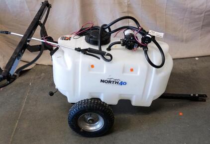 This is a North 40 Outfitters 25-Gallon Trailer Sprayer With a Two-Nozzle Boom.