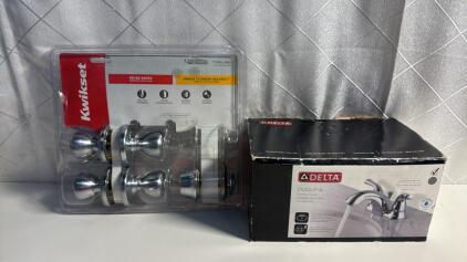 (1) NIB Delta 2520LF-A Faucet (1) KwikSet Keyed Entry Set Minus 1 Deadbolt