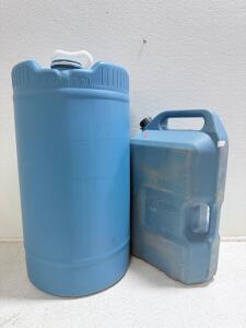 (2) Blue Plastic Barrels