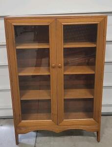 (1) Brown Glass Cabinet