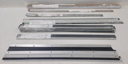 (5) Used 34.5" Weatherstrip Door Bottoms (7) *New in pkg* 36" Weatherstrip Door Bottoms (2) 42" Door Bottom (1) *New in pkg 36" Brush Weatherstrip Door Bottom (1) 42" *New in pkg* Brush Weatherstrip Door Bottom (3) 48" *New in pkg* Brush Weatherstrip Do
