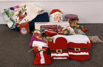 Christmas Lights, Christmas Themed Oven Mitts, Christmas Themed Vintage Truck Model, (2) Wine Bottle Bags, (2) Decorated Vintage Tree Skirts, Christmas Cookie Tin And More