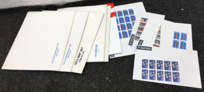 (6) Mint Sets of Post Office Stamps, (5) Sealed Sheets of Stamps