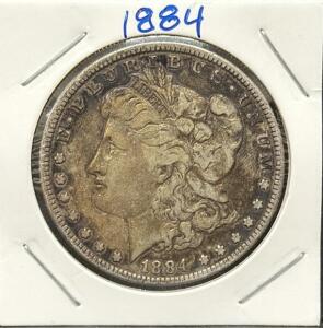 1884 Morgan Silver Dollar, United States, "E Pluribus Unum" Inscription