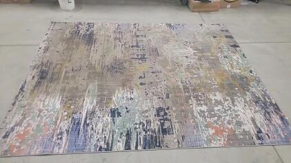 (1) 8'x10' Decorated Rug