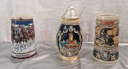 (1) 9" German Beer Stein W/ Lid , (1) 8" - 1989 Budweiser Collectible Beer Stein & (1) 8" - 1989 Coors Collectible Beer Stein