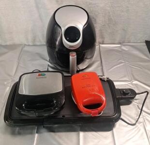 (1) Air Fryer, (1) Electric Griddle, (1) Black & Decker Mini Electric Griddle & (1) Sandwich Griddle