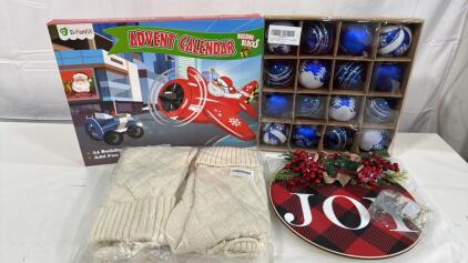(1) Bag Of 4 18&rdquo; Knit Stockings (1) Joy Christmas Sign (1) Box Of 16 Ornaments (1) Building Block Christmas Advent Calendar