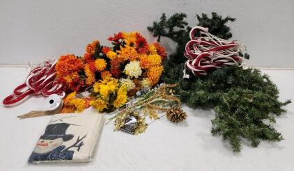 (1) Snowman Designed Pillow Cases (2) Candy Cane Lights And Assorted Artifical Flowers And Artifical Garland