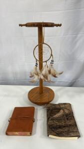 (1) Spinable Jewelry Carousel (1) Beautiful Small Dream Catcher (1) Leather Bound Note Book 7&rdquo;x5&rdquo; (1) Hide W/Hair Bound Note Book 9&rdquo;x6&rdquo;