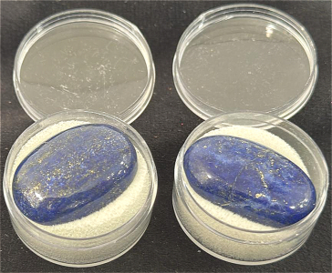 (1) Lapis Lazuli Cabochon Stone Weighing 53.75 Carats. (1) Lapis Lazuli Cabochon Stone Weighing 49.75 Carats.