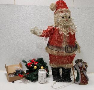 (1) 49" Light-Up Santa Claus Decoration (1) Hand-Painted Ceramic Santa Claus Figurine (1) Box of Assorted Liyar 5g Containers (1) Artifical Garland (1) 'Snow' Ceramic Lantern
