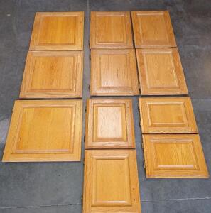 [11] Solid Oak Cabinet Doors In Multiple Sizes. [4] 22.5"x15.5", [2] 23.5"x20.25", [2] 16.75"x14", [2] 19"x14.75" [1] 22"x22.5"