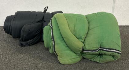 (1) Slick Sleeping Bag And (1) Fabric Sleeping Bag