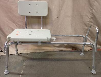 DMI Heavy-Duty Sliding Transfer Bench with a Cut-Out Seat, designed to Assist Individuals with Mobility Issues to Safely Get in and Out of a Bathtub or Shower.