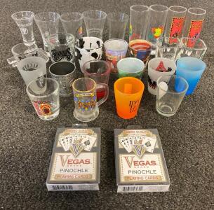 (26) Various Shot Glasses And (2) Vegas Brand Pinochle Playing Cards