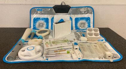 Nintendo Wii System, Konami Wii Dance Mat, Wii Games, Controller Grips, Controller Charging Hub, And Controller Attachments