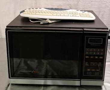 (1) Amana Radarange Microwave & (1) Logitech USB Keyboard