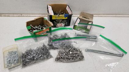 (1) Box Of Grip Rite Fas'ners 6.03cm Nails (1) Box Of Grip Rite Fas'ners Hot Galvanized Joise Hange 1-1/4" Nails And Assorted Nails And Bolts
