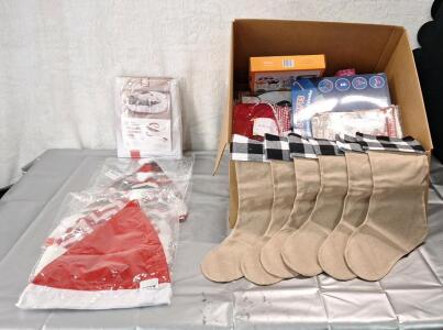 (1) 4-Pack Of Santa Hats, (1) 6-Pack Of Christmas Stockings, (1) Wreath Storage Bag & (1) Box Of Assorted Christmas Decor