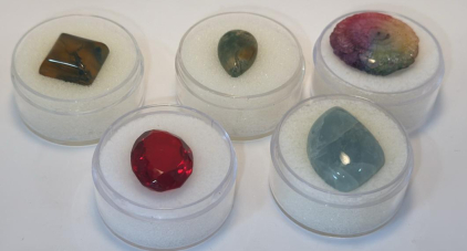 (1) 7.95ct. Natural Moss Agate Square Gemstone (1) 4.35ct. Natural Moss Agate Gemstone (1)9.30ct. Brazilian Red Topaz Faceted Gemstone (1) 14.85ct. Aqua Blue Natural Aquamarine Gemstone (1) 14.85ct. Rainbow Quartz Gemstone