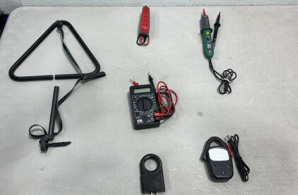 Vintage A.W. Sperry Energizer Model E-1 Snap Around Volt OHM Ammeter, a type of clamp meter used for measuring electrical parameters,(1)Commercial Electric MS8922H Voltage Tester,(1)Amprobe PY-1A AC/DC Voltage Tester,(1)A.W. Sperry Mini Probe AC Volt-Amme