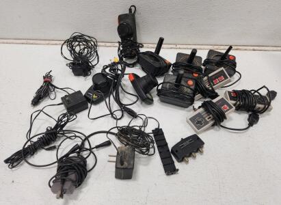 (3) Nintendo Entertainment System Controllers (4) Atari 2600 Joystick Controllers (2) Atari 2600 Pong Paddle Controllers And Assorted Cords