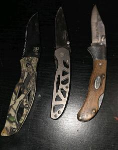 (1) Winchester Tactical pocket Knife, (1)Remington Folding Pocket Knife, (1) Unbranded Folding Pocket Knife.