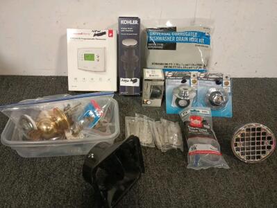 Programmable Thermostat, Clicker For Garbage Disposal, Dishwasher Drain Hose Kit, Drain Covers And shower Drain, Various Door Hardware And Hinges.