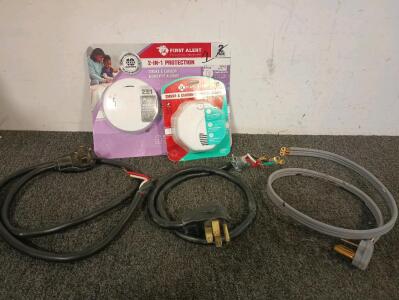 2 - Smoke and Carbon Monoxide Detectors NIB, 2 - 5 Foot 220 Volt Cables With 14-50 Type Plugs, 1 - 4 Foot 220 Volt Cable With 10-30 Type Plugs.