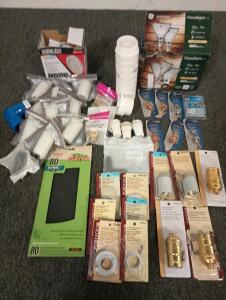 90 watt outdoor floodlights, various ceiling fan accessories, various plumbing unions.