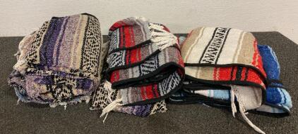 Stack Of Assorted Traditional Mexican Ponchos