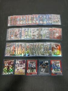 (50) Assorted Football Cards Including Zennith, Select And Donruss Optic Antonio Gibson, Drew Lock In Plastic Hard Cover