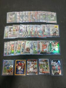 (50) Assorted Football Cards Including Prizm, Select And Donruss Optic Joe Mixon, A.J. Brown In Plastic Hard Cover