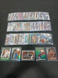 (50) Assorted Basketball Cards Including Bowman Chrome, Prizm And Donruss Luka Doncic, JuJu Watkins In Plastic Hard Cover