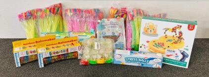 (4) Water Balloon Packs, Water Beads, (2) Silicone Water Balls, Rainbow Rainmaker Toy, Stress Balls, Shooting Hoops Mini Party Favor Toys, and Screw Puzzle Suitcase