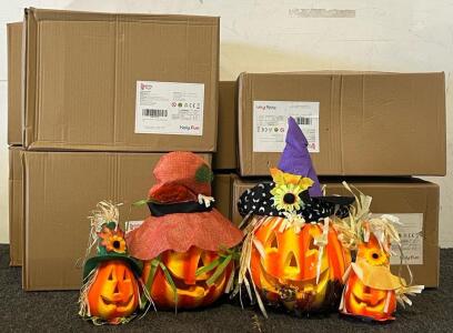(4) Boxes Of Light Up Pumkpin Halloween Decor & (4) Boxes Of Swinging Skeleton Ghost Halloween Decorations