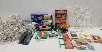 (4) GE 300-Light Icicle String lights (2) Adams All-Purpose Light Holders (3) Christmas Light Storage Reel And More