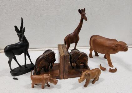(1) Vintage Hand-Carved Dark Wood Elephant Bookend Pair (1) Hand-Carved Teak Wood Rhinoceros Figurine (1) Hand-Carved Wooden Antelope Figurine And More