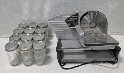 (1) Genuine Waring Pro (FS150) Electric Counter Top Food Slicer, tested, does run but very dirty (12) Ball 12oz. Quilted Crystal Jars