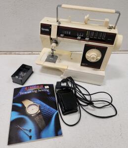 (1) Singer Sonata Model 6610 10-Stitch Sewing Machine W/ Power Cord And Pedal (1) Singer Timesaving Sewing Reference Library And Accessories